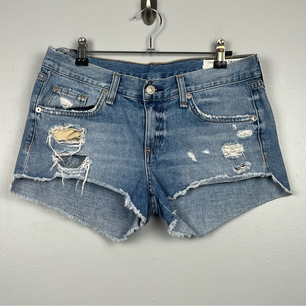Rag & Bone distressed raw hem light wash denim shorts in color Gunner, size 25.